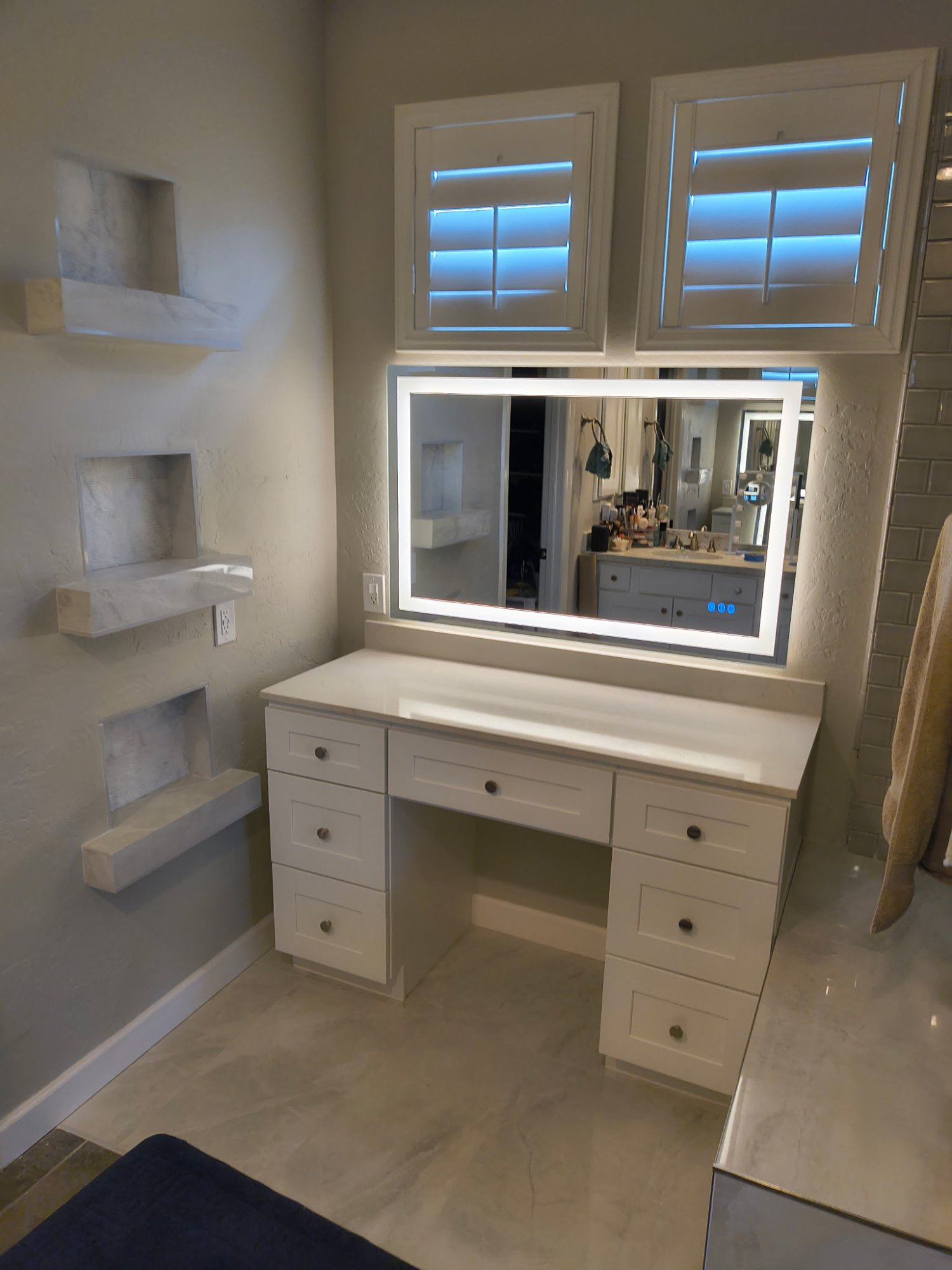 Vanity and niche shelves in progress with LED lighting